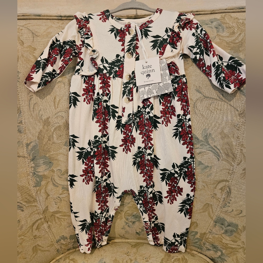 kate quinn cream romper with red floral & green leaves